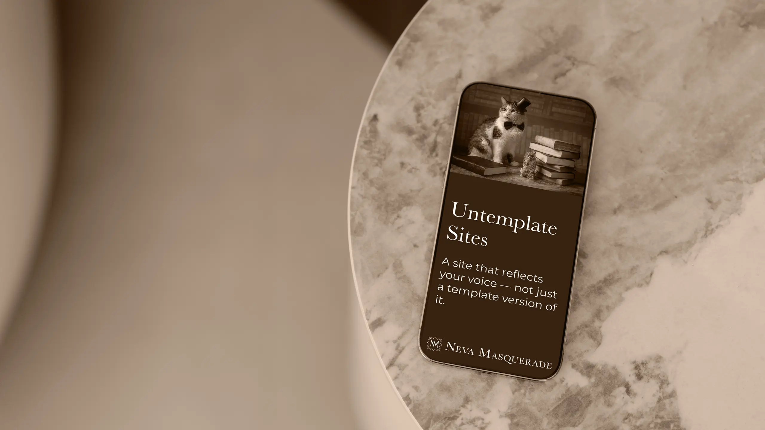 A phone displaying an Untemplate Site graphic with a cat wearing a tophat.